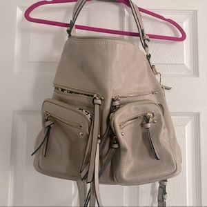 Purse-Multiple pockets located  inside/outside